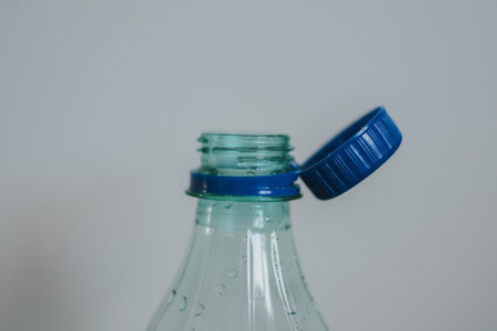 Innovation in the form of a new water bottle cap close-up. Helps save the environment and recycle...