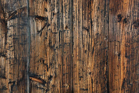 Top view of Christmas decorations in open gift box and green Christmas tree branch on plain background. Red packaging lid with lush bow. Merry Christmas and Happy New Year. copyspace. vertical photoの写真素材