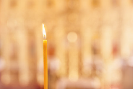 Candles burning in church background. Card with Copy Space for text.の写真素材