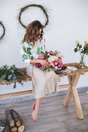 Beautiful girl with bouquet..の写真素材