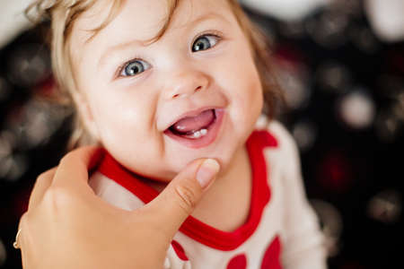 First tooth in a child.の写真素材