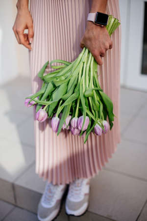 Bouquet of tulips in hands.の写真素材