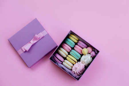 Gift box with macaroons and marshmallowsの写真素材