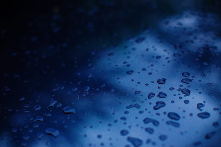 Drops of water on a glossy surface