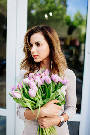 Bouquet of tulips in hands.の写真素材