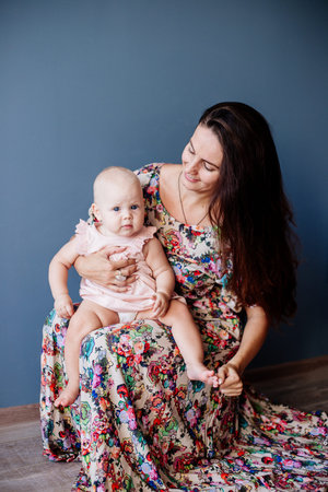 Little baby girl and her mom.