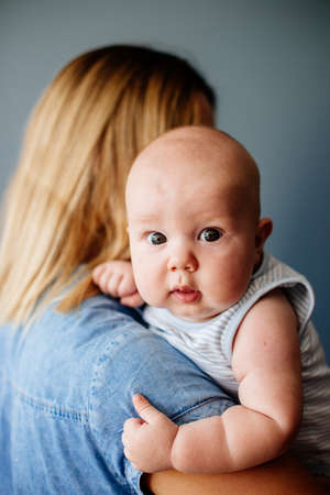 A little baby and his mom.の写真素材