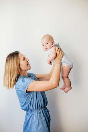 A little baby and his mom.の写真素材