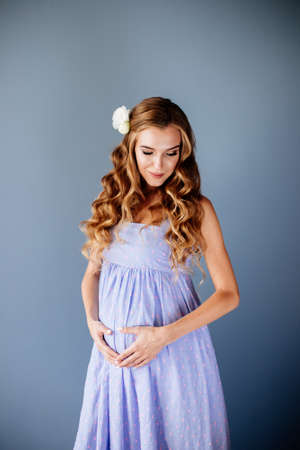 Beautiful pregnant young woman.の写真素材