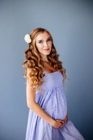Beautiful pregnant young woman.の写真素材