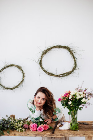 Florist makes a bouquet.
