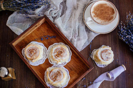 Coffee, cinnabon and lavender.の写真素材