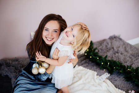 Mom and daughter in the New Year holidays.の写真素材