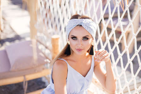 Portrait of beautiful sensual woman with turban.の写真素材