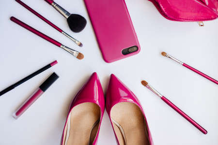 Pink shoes, cosmetics and accessories.の写真素材