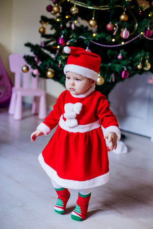 Little girl in santa costumeの写真素材