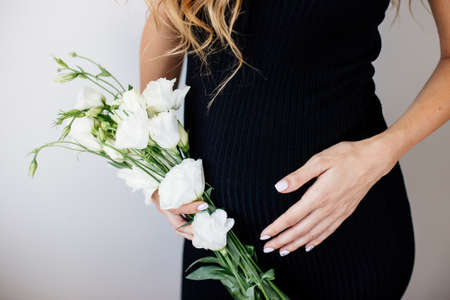 Beautiful pregnant young woman.の写真素材