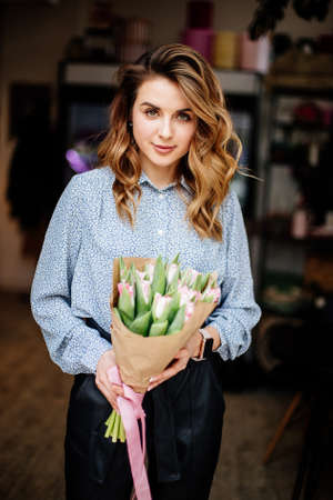 Bouquet of tulips in hands.の写真素材