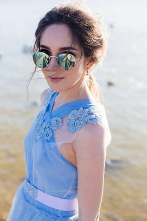 Beautiful girl in sunglasses.の写真素材