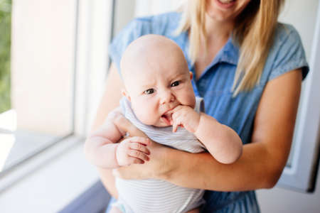 A little baby and his mom.の写真素材