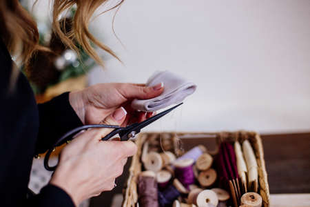 Florist woman makes a bouquetの写真素材