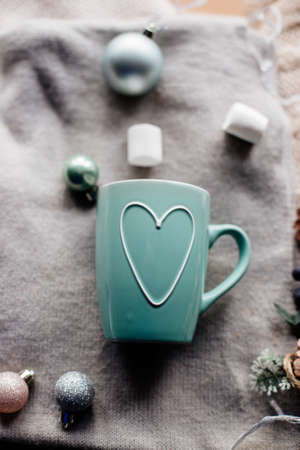 Cup of cocoa with marshmallows on table.の写真素材