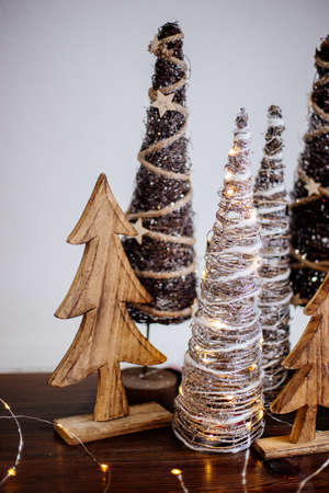 Wooden christmas trees on table.の写真素材