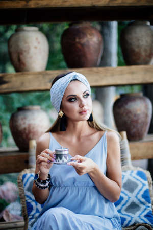 Portrait of beautiful sensual woman with turban.の写真素材