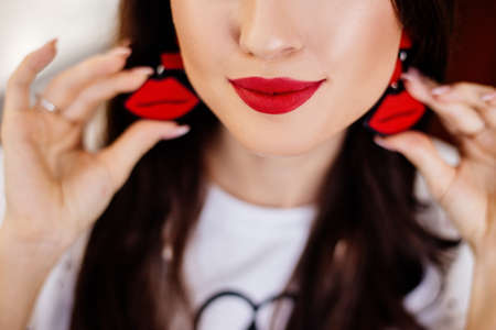 Beautiful woman with red lipsの写真素材