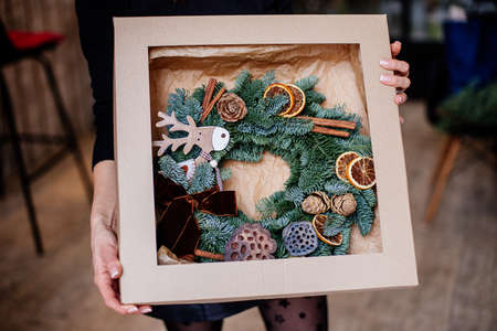 Beautiful christmas wreath at table.の写真素材