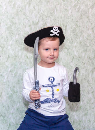Emotions and a smile. A boy with blue eyes. Portrait of child.の写真素材