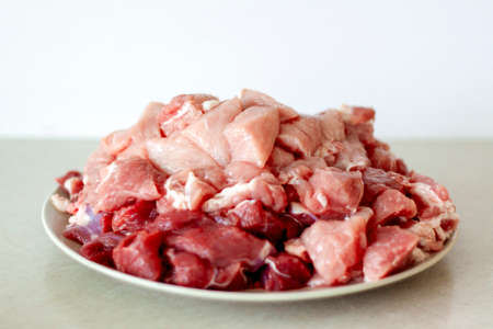 Meat in a meat grinder. Food preparation. Meat for cutlets. Production. Minced meat.の写真素材