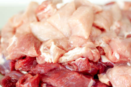 Meat in a meat grinder. Food preparation. Meat for cutlets. Production. Minced meat.の写真素材