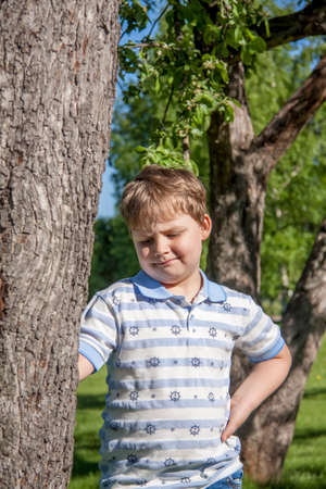 Warm may. Spring walk. Funny games for children on the lawn.の写真素材