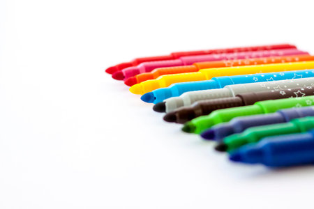 Bright markers for design. Markers on a white background. Markers for drawing.