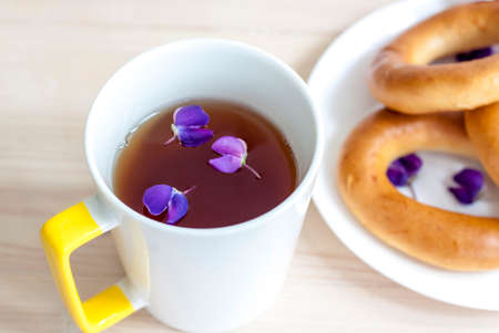 Fragrant tea with bagels. Tea with pleasure.の写真素材