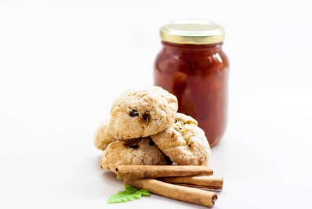 Fragrant cookies with cinnamon and jam. Sweets on the table. Light and light composition.の写真素材