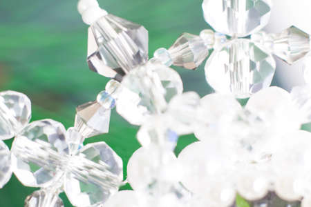 Background of abstract glittering lights. Blurred crystal beads for the background. de-focus. Use it as a background for your presentation.の写真素材