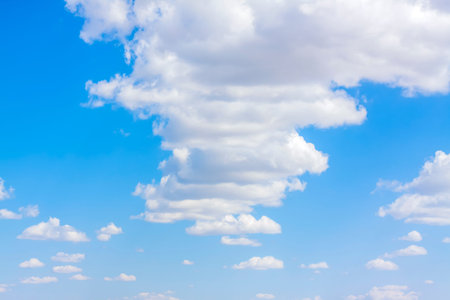 Blue sky with white clouds. The clouds in the sky.