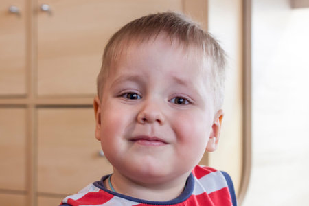 Portrait of a cute little boy. The emotions of a child. Close-up portrait.