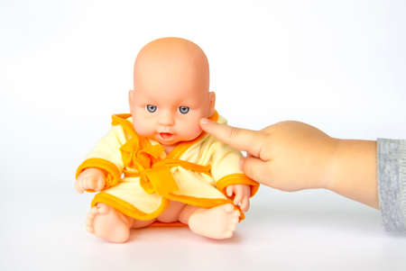 A child plays with a doll background.の写真素材
