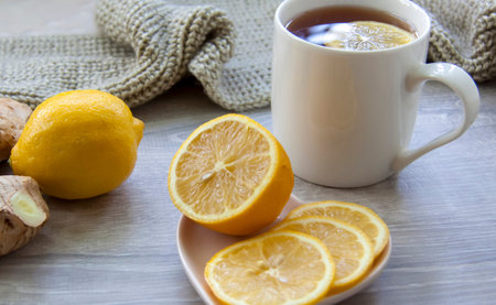 Ginger tea with lemon. Season of colds and infections. Strengthening of immunity. A Cup of tea with...