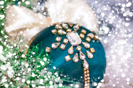 Beautiful Christmas ball for Christmas tree. Ball in rhinestones. New year's greetings, greeting card, calendar.の写真素材