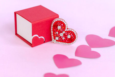 Red heart made of beads. Pink hearts. The concept of the Valentine's Day theme. A greeting card, a declaration of love. February 14の写真素材