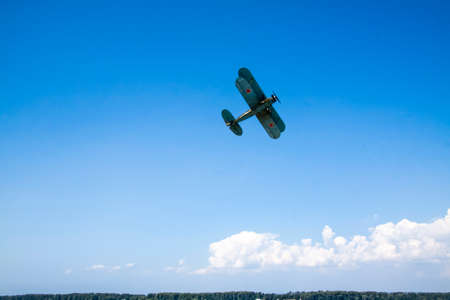 Samara, Russia, 2016-07-31, Holiday of the Navy. Showing military vehicles in action. Reconstruction of the fighting on the Volga River. A plane in the sky. Militaryのeditorial素材