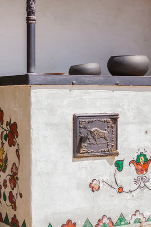 2021-05-07. Russia. Kamensk-Shakhtinsky, Rostov region. Beautiful decor elements in the park for tourists. An old Russian stove that is heated with wood. LOGA Landscape Parkのeditorial素材