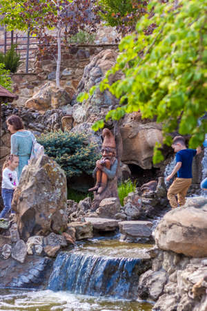 2021-05-07. Russia. Kamensk-Shakhtinsky, Rostov region. Beautiful decor elements in the park for tourists. Waterfall among the rocks. LOGA Landscape Parkのeditorial素材