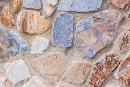 The walls are made of natural stone. background, texture. Close-up background. Texture for the background.の写真素材