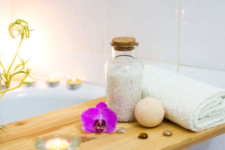 Spa-beauty salon, wellness center. Spa treatment aromatherapy for a woman's body in the bathroom with candles, oils and salt. Lifestyle and cosmetic conceptの写真素材