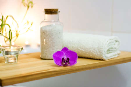 Spa-beauty salon, wellness center. Spa treatment aromatherapy for a woman's body in the bathroom with candles, oils and salt. Lifestyle and cosmetic conceptの写真素材
